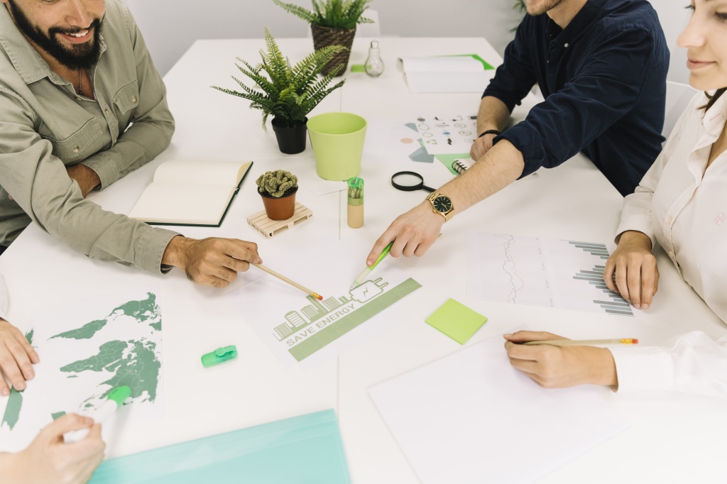 group-of-businesspeople-making-plans-on-energy-saving-at-workplace.jpg group-of-businesspeople-making-plans-on-energy-saving-at-workplace.jpg
